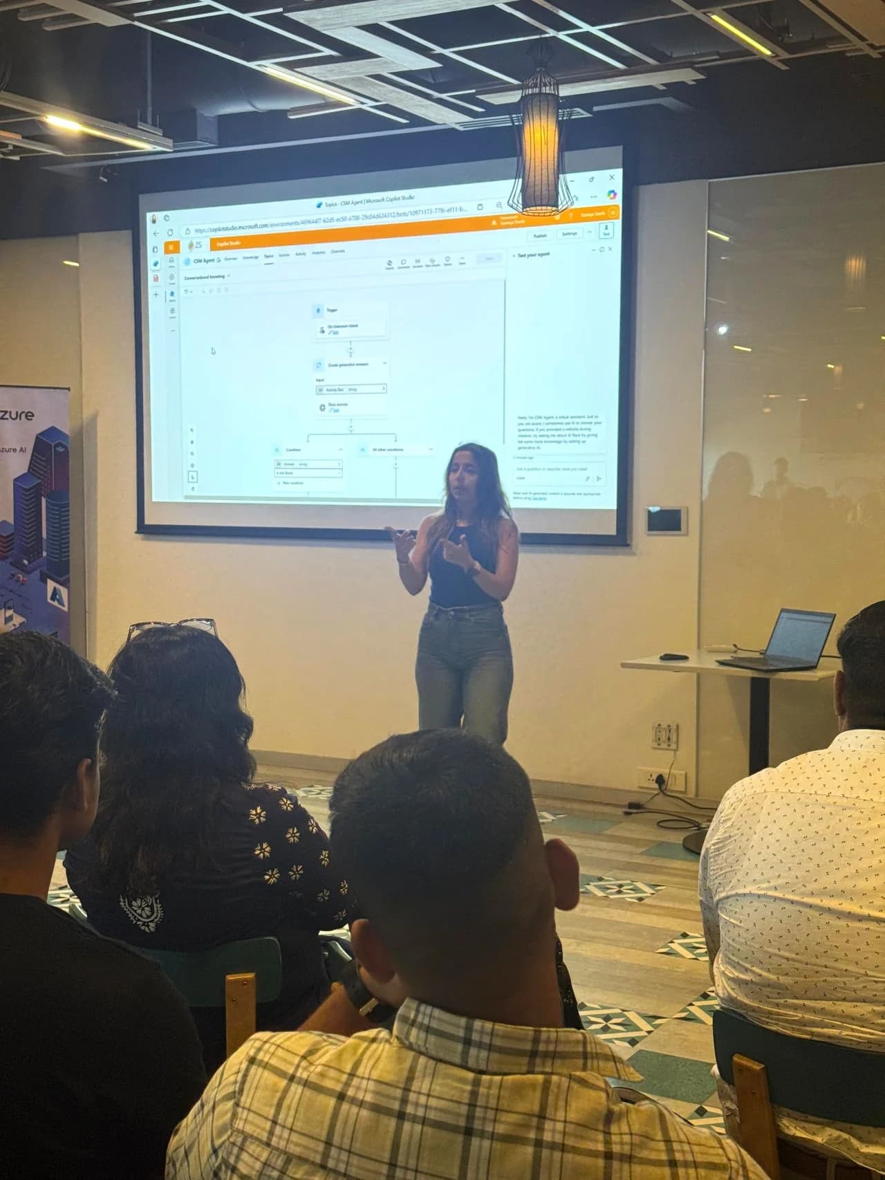 Saumya Smriti presenting a Copilot workflow demo to an audience.